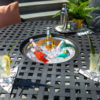 ROSARIO Barbecue Set - Hartman. The table is shown with the central ice bucket filled with ice and drinks