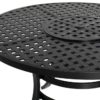 Detail of the top of the ROSARIO multifunctional dining table. In the photo, the central area where the barbecue or the grill are placed is covered. On a white background