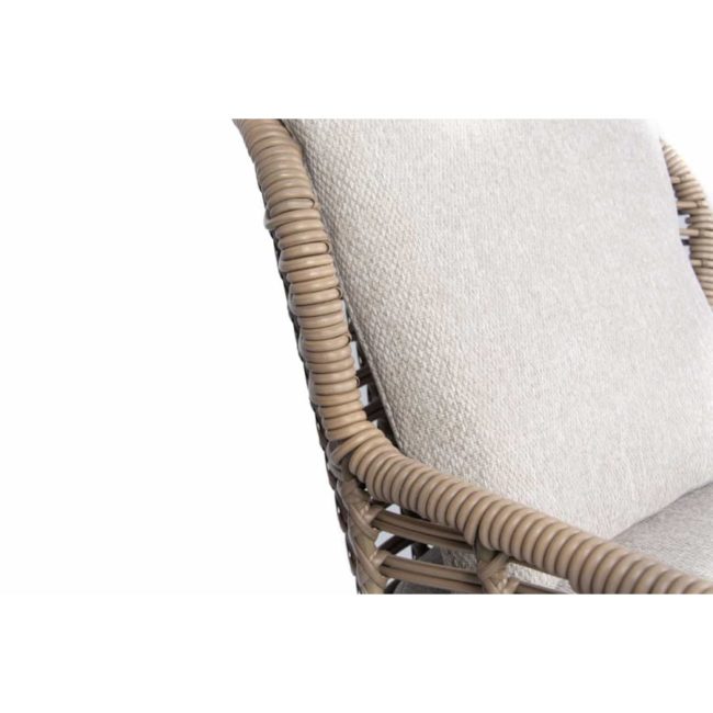 LUGANO dining chair detail of the weaving around the structure of the hularo wicker armrests and the cushions