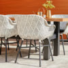 Yasmani Delphine D Dining Set from Hartman. Made up of the Yasmani dining table measuring 180x95cm with anthracite aluminium legs and a teak top, paired with 6 Delphine Diamond chairs, in black and white with anthracite legs.