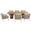 Outdoor dining set featuring the 240cm Capri Barrel Low table and 6 Sardinia Low chairs, 3 on each side, with the left-hand one set apart to reveal the table's beautiful leg. Find it at De Tropen, official 4 Seasons Outdoor supplier in Spain. Front view of the horizontal table against a white background.