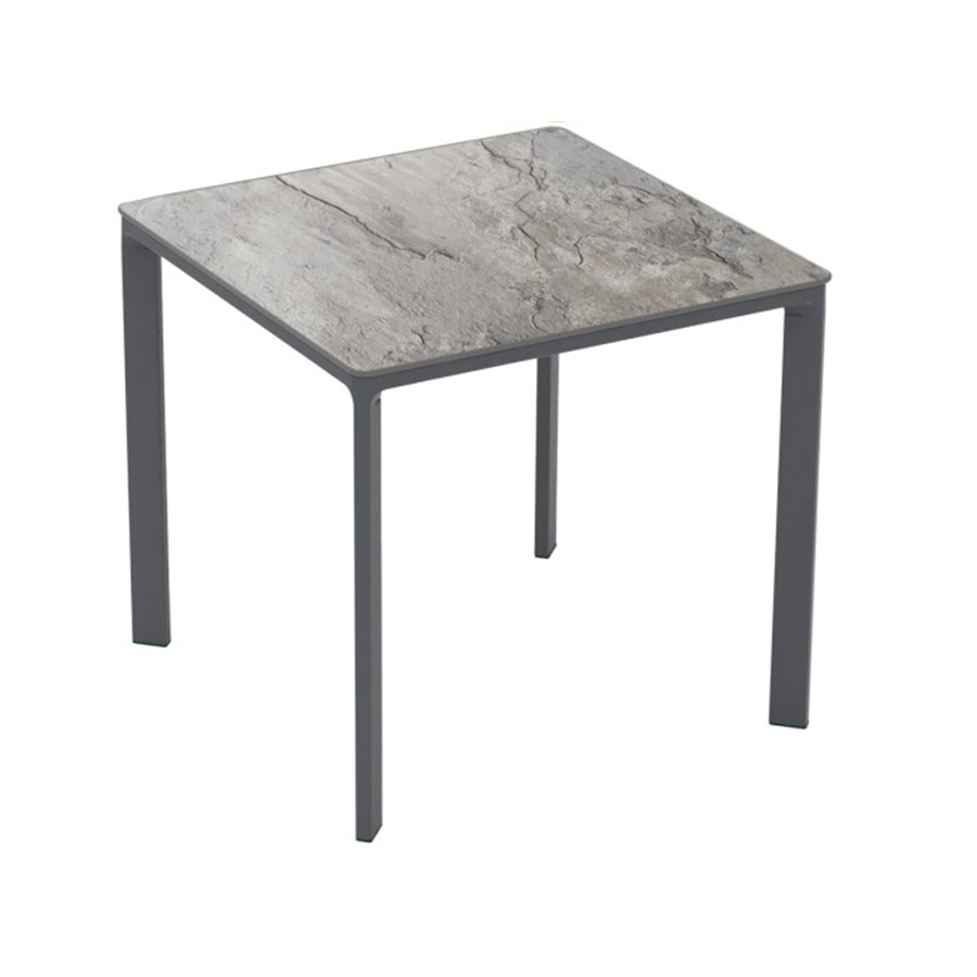 Meet Table by Ezpeleta 80x80cm With an anthracite aluminium structure and a stone HPL top. Suitable for indoor and outdoor use, both for public and residential settings. Find it at De Tropen, your outdoor furniture expert. Oblique front view