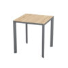 Meet Table by Ezpeleta 70x70cm With an anthracite aluminium structure and an oak HPL top. Suitable for indoor and outdoor use, both for public and residential settings. Find it at De Tropen, your outdoor furniture expert. Oblique front view