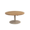 Saba Low Table by 4SO. Front view taken slightly from above to showcase the teak tabletop in a deep, intense orange-brown characteristic of this natural, FSC-certified tropical wood. Made of slats and finished with a rounded, perpendicular slat edge to create a circular shape. Its base is both original and practical: a single cylindrical central leg attached to a circular base, providing stability and strength. This base is made of aluminum and finished in a latte color (coffee with milk or toasted beige), a trending color for 2025. Buy it at De Tropen, your expert in garden and patio furniture. Front view taken slightly from above.