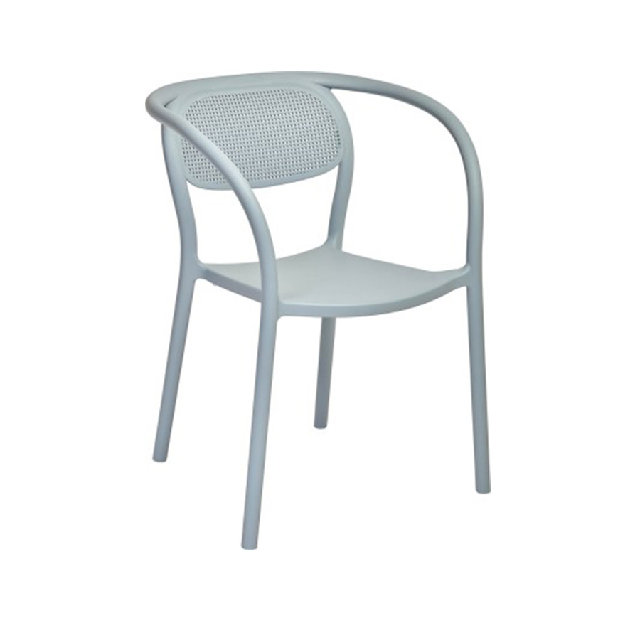 The Noon armchair in Blue Grey, a baby blue, is from the Valencian brand Ezpeleta. Its matte finish makes this armchair even more sophisticated. Made of fiberglass-reinforced polypropylene, it's a very comfortable chair, especially thanks to the curved backrest that cradles and supports the back. The same line runs through the front legs, armrests, and backrest, seamlessly blending into the rest of the structure, as it's a single, monoblock piece. The backrest mimics the weave of classic rattan, forming circles that allow air to circulate. It features non-slip feet and UV protection. It's 100% recyclable and suitable for both indoor and outdoor use. Ideal for residential and public spaces. Find it at De Tropen, your outdoor furniture expert. Oblique front view.
