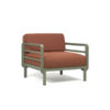 Maximo armchair by Nardi. A garden armchair with clean, modern lines, combining 4 colours of regenerated fiberglass-reinforced polypropylene resin frame with 4 colours of Sunbrella fabric, also made from recycled material. A clear statement of intent to care for the planet and beautify your outdoor space. Oblique front view. Secure online purchase and fast shipping with De Tropen.