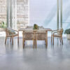 Ravona garden dining table by GardenLine, lifestyle photo of the table with 6 Ravona chairs, front view, situated indoors right by the passage to the terrace. Expand your outdoor living with De Tropen®, come and discover the largest garden furniture shop on the Costa del Sol, Málaga and Granada.