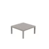 Mesa Auxiliar Spritz 59 jardín Tortora de Vondom. Con el característico patrón de lamas de la serie Spritz. Cómpralo online en De Tropen la mayor tienda de muebles de jardín de Málaga.